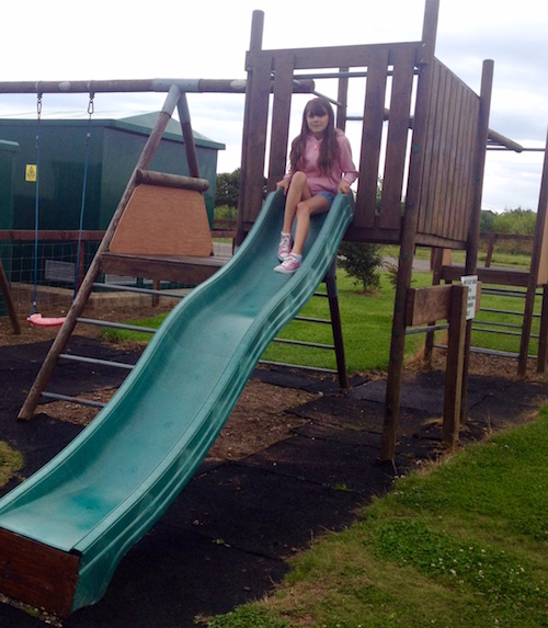 A child on a chute at Silverdyke Park